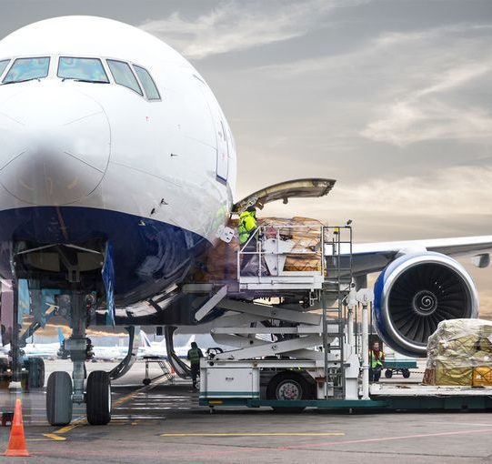 Loading,Cargo,On,Plane,In,Airport,Before,Flight
